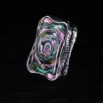 Aura Sand Jing Hong (Titanium) — purple and green side view